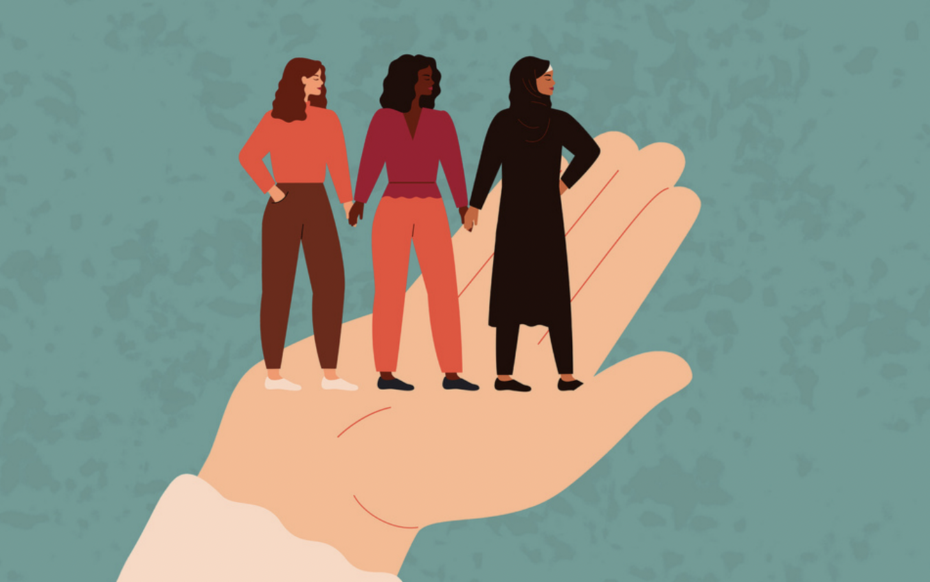 Three women in palm of hand